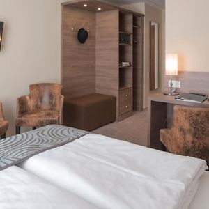 Kleine Kamer met een Queen Size Bed